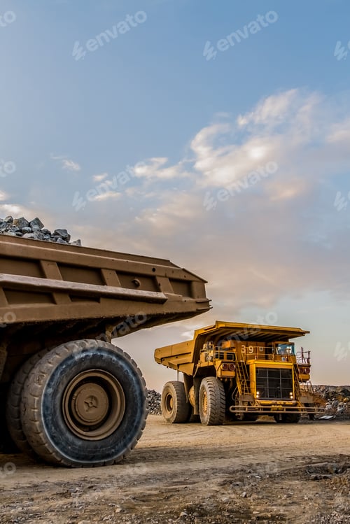 Preview: Mining dump trucks transporting Platinum ore for processing