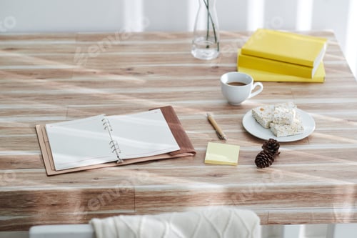 Preview: Opened planner on desk