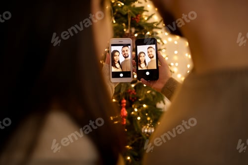 Preview: Happy couple making a video call on Christmas holidays