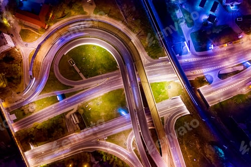 Preview: Night Aerial view of a freeway intersection traffic trails in ni