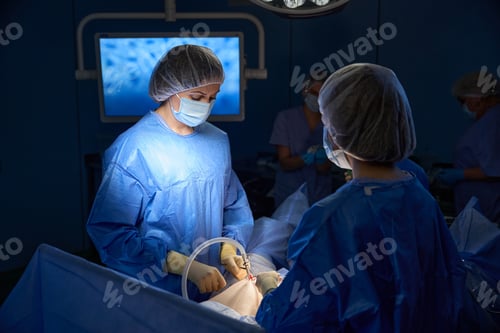 Preview: Surgeons Performing Operation in Operating Room
