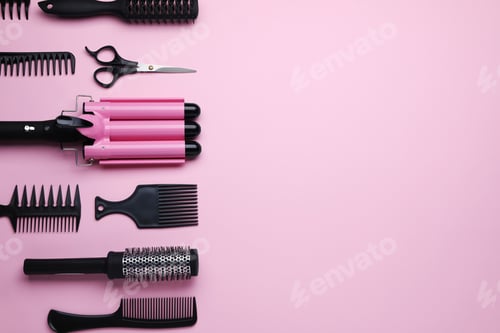 Preview: Flat lay composition with modern hair triple curling iron on pink background, space for text