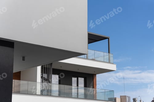 Preview: Contemporary luxury home exterior showcasing clean lines, a mix of materials
