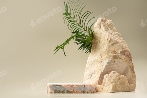 Preview: Granite stone with branch green leaf on beige background
