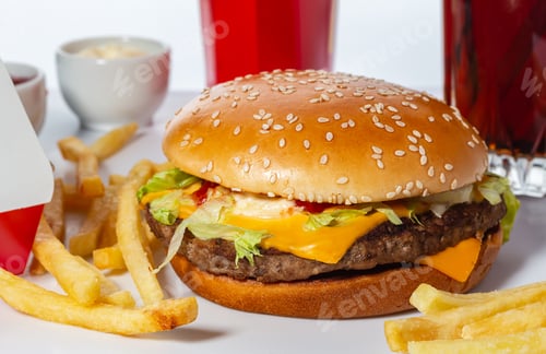 Preview: Close-up big juicy meat burger. Soft and crispy sesame seed bun.
