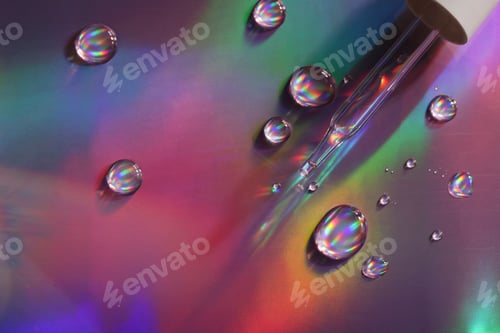Preview: dense liquid, dripping, flowing, skincare concept. Cosmetic pipette with drops of serum, vitamin