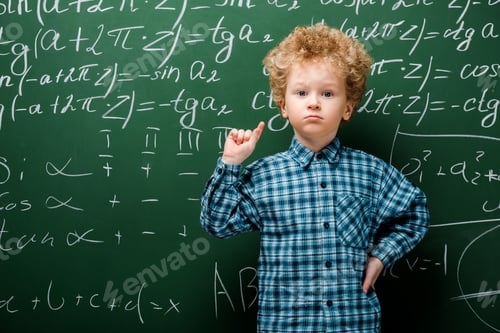 Preview: smart kid standing with hand on hip near chalkboard with mathematical formulas
