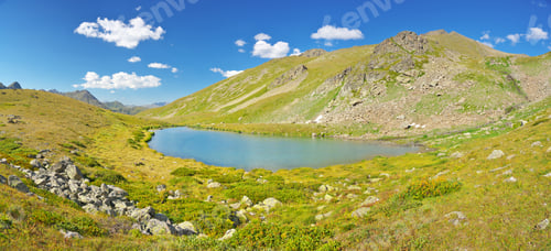 Preview: Panoramic view in mountain with lake at day.