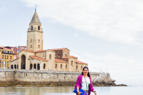 Preview: Gijon Asturias coast San lorenzo beach. Latin mid venezuelan tourist woman vacation destination