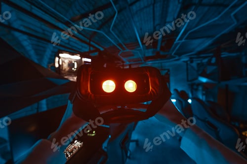 Preview: Young woman puts on neon 3d virtual reality glasses.
