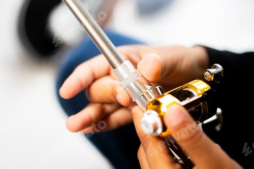 Preview: Hands Assembling Metallic Device