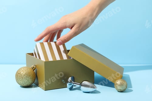 Preview: Metal butt plug with New Year's decor on a blue background.