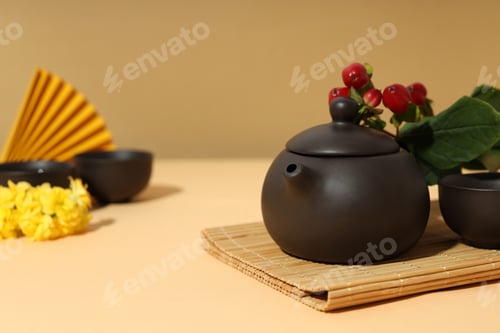 Preview: Asian tea concept, traditional dishes on yellow background.