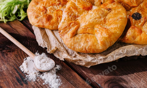 Preview: Cooking traditional pies with cabbage on wooden board