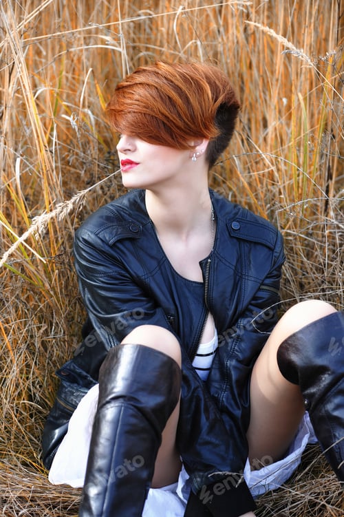 Preview: Beautiful sensual girl posing in the grass