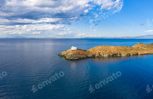 Preview: Greece, Kea Tzia island. Lighthouse on rocky cape, sky, sea background.