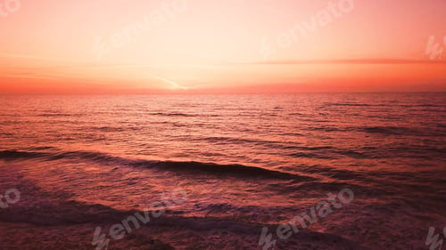 Preview: Aerial view of beach at sunset