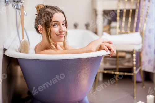Preview: Woman bathing at the retro bathroom