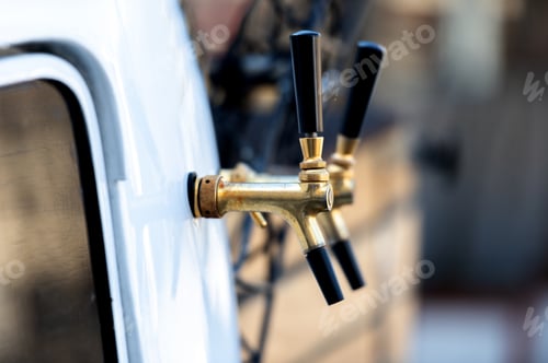 Preview: Close-up of beer bus tap in the old town of Riga