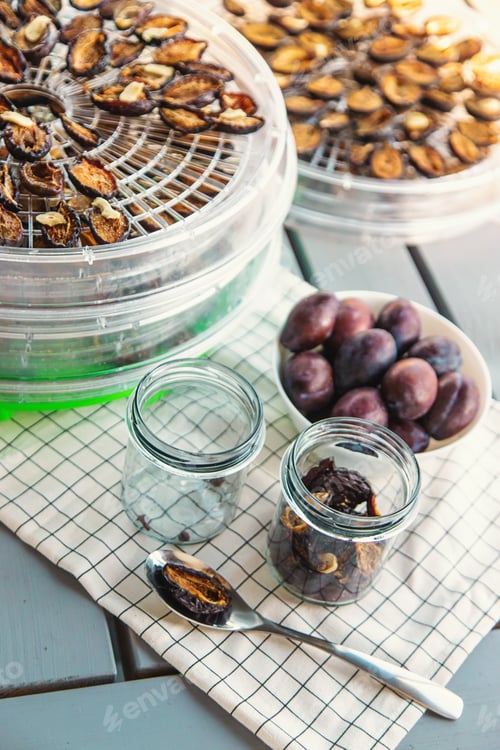 Preview: Plums dried in a dehydrator. Selective focus.