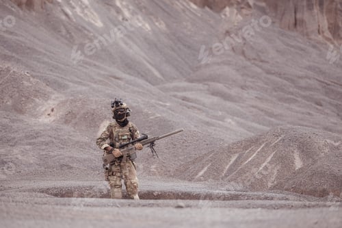 Preview: Soldiers in camouflage military uniforms carrying weapons Reconnaissance missions in rugged mountain