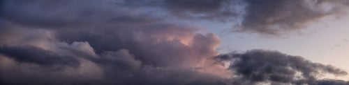 Preview: Dramatic Panoramic View of a cloudscape during a dark, rainy and colorful sunset