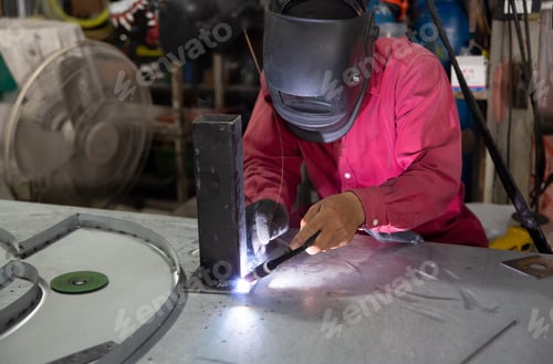 Preview: Welder working at the factory. Welding process. Welder occupation
