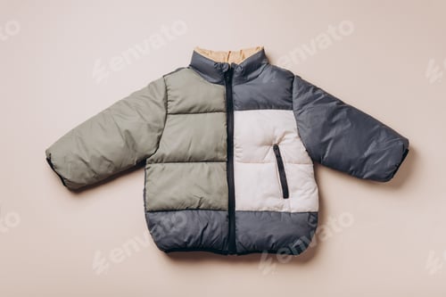 Preview: Fashion baby colorblock puffer jacket. Newborn beige clothes outfit. Winter, autumn collection