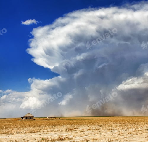 Preview: A powerful supercell with strong rear flank downdraft wrapping from left to right in this image