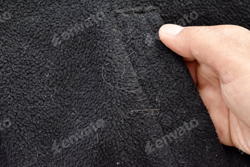 Preview: Cat or dog hair on jumper.