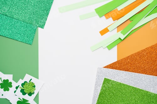 Preview: Irish flag made from color paper with cut out shamrock clover and glitter paper
