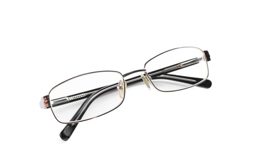 Preview: Glasses with corrective lenses on white background. Vision problem