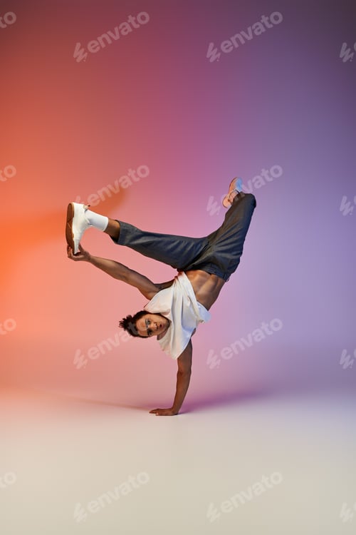 Preview: A young man dancing in a colorful studio