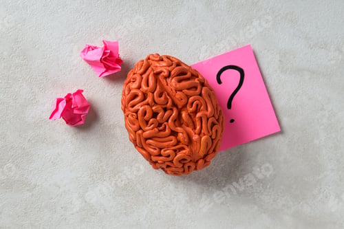 Preview: Decorative brain and pink paper on light background