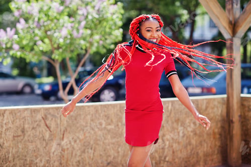 Preview: African american girl in red dress with dreadlocks