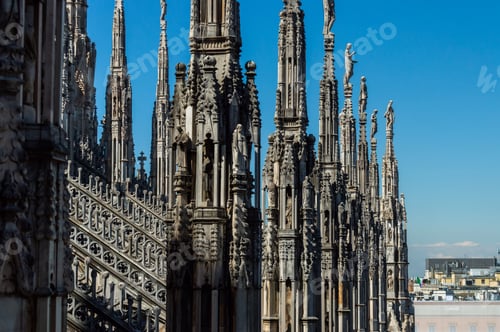 Preview: Milan Cathedral Statues Against Sky