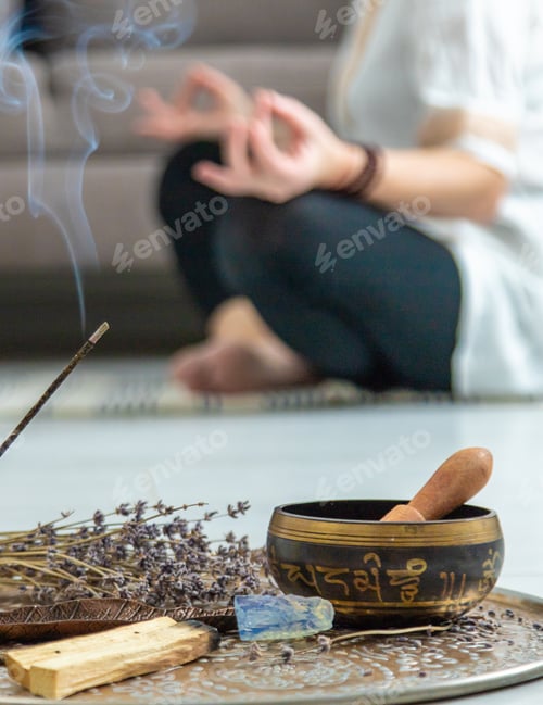 Preview: Woman doing yoga at home and aromatherapy. Selective focus.