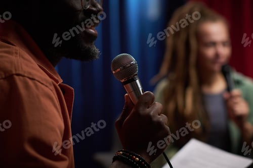 Preview: African American Man Holding Microphone During Performance