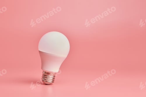 Preview: Light bulb, copy space. Energy saving minimal idea concept.Pink background.