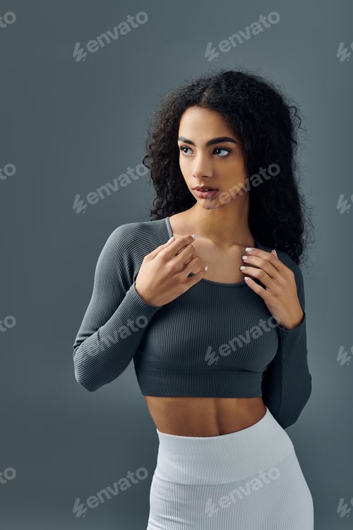 Preview: African american woman in grey studio