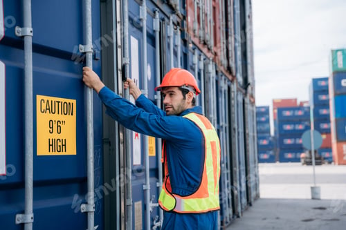 Preview: Engineer or foreman checking inventory or task details at Container cargo harbor.