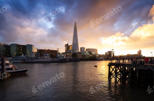 Preview: View of River Thames and City Skyline during dramatic sunset. City of London, United Kingdom