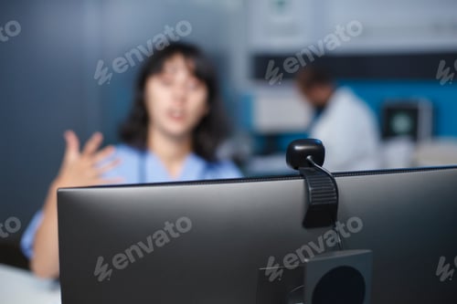 Preview: Nurse having a video call in hospital