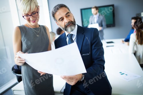 Preview: Business people having fun and chatting at workplace office