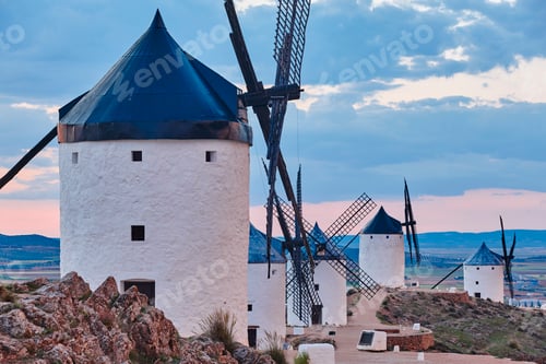 Preview: Traditional antique windmills at sunset in Spain. Consuegra, Toledo. Travel