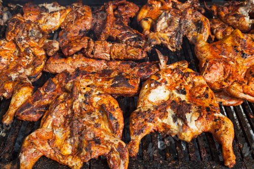 Preview: Chickens cooking on a barbeque grill