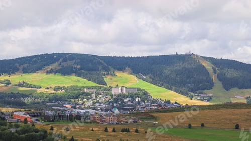 Preview: A view to the Kurort Oberwiesenthal city and mountain Fichtelberg