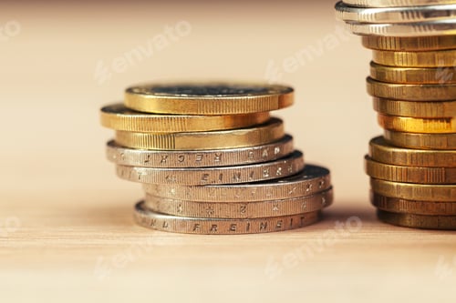 Preview: piles of coins on working table