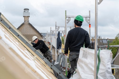 Preview: Roofing team working at height