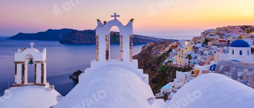 Preview: White churches an blue domes by the ocean of Oia Santorini Greece, traditional Greek village